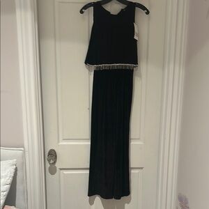 Elegant Black Sleeveless Gown with Beaded Waist